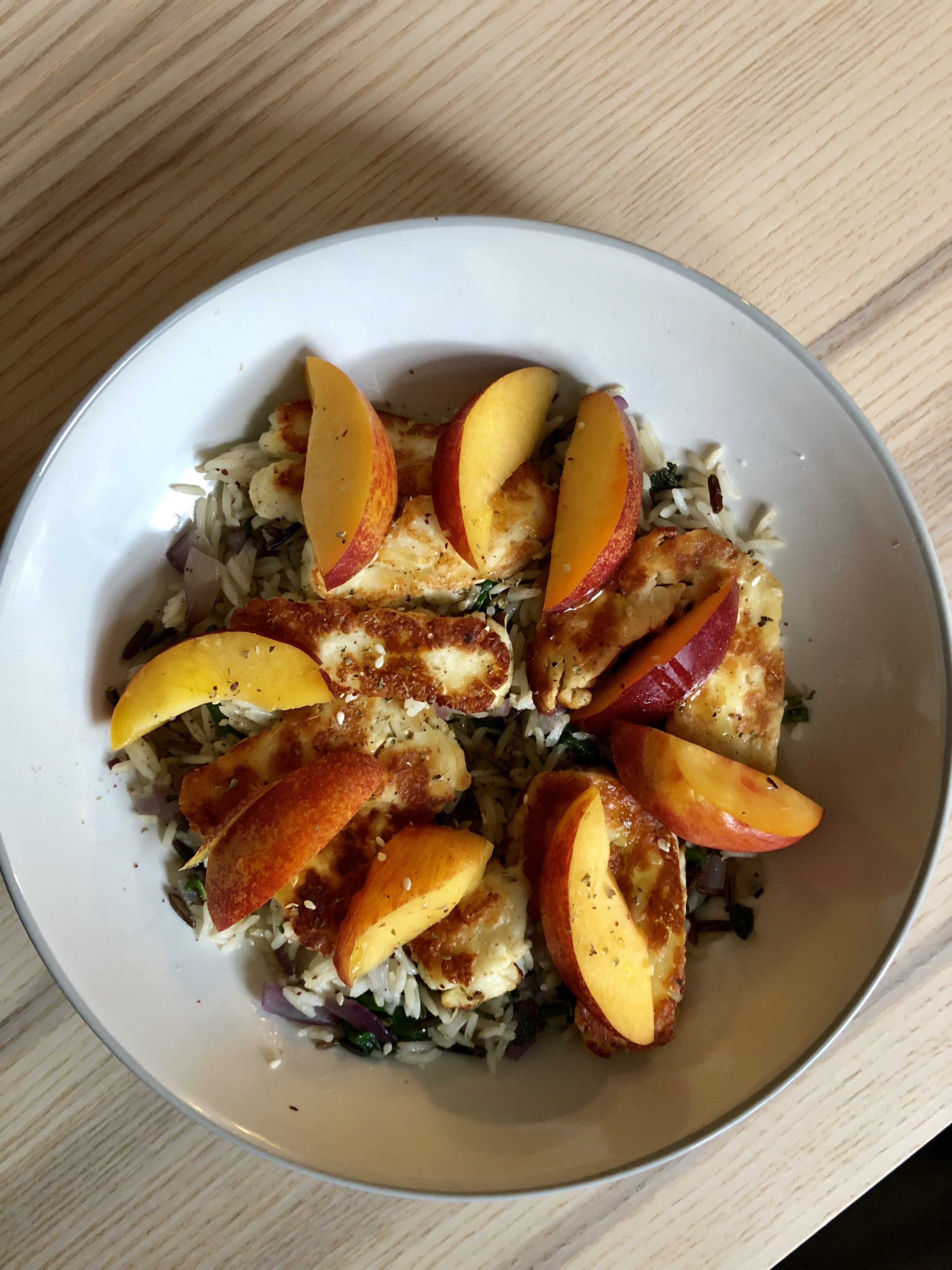 Wild rice, za’atar, halloumi, nectarines, mint